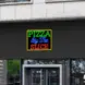 Pizza By The Slice Neon Sign_Black_Mockup_Template02