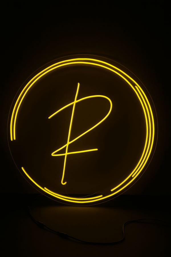 Yellow circular script P monogram custom LED neon sign